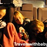 RideSafer travel vests help fit three across the back seat of a small rental car in Spain..