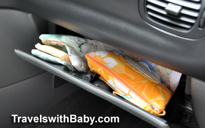 huggies-diaper-glove-box Use your glovebox for quick-access storage of diapers and travel-size wipes for front seat diaper changes.