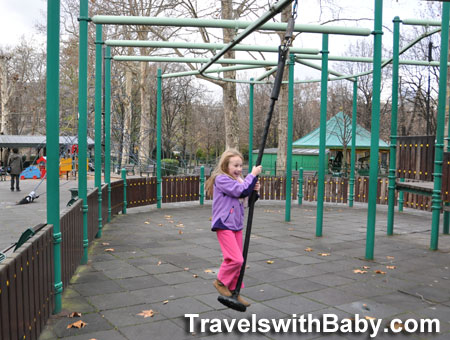 kid ziplining at park