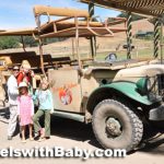 family with safari jeep