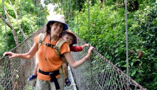 Author Shelly Rivoli with her toddler at Hanging Bridges park near Arenal Volcano in Costa Rica.